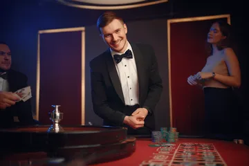 A cheerful woman in traditional clothing using her smartphone during a festive moment, showing how easily the A177 app fits into everyday life.